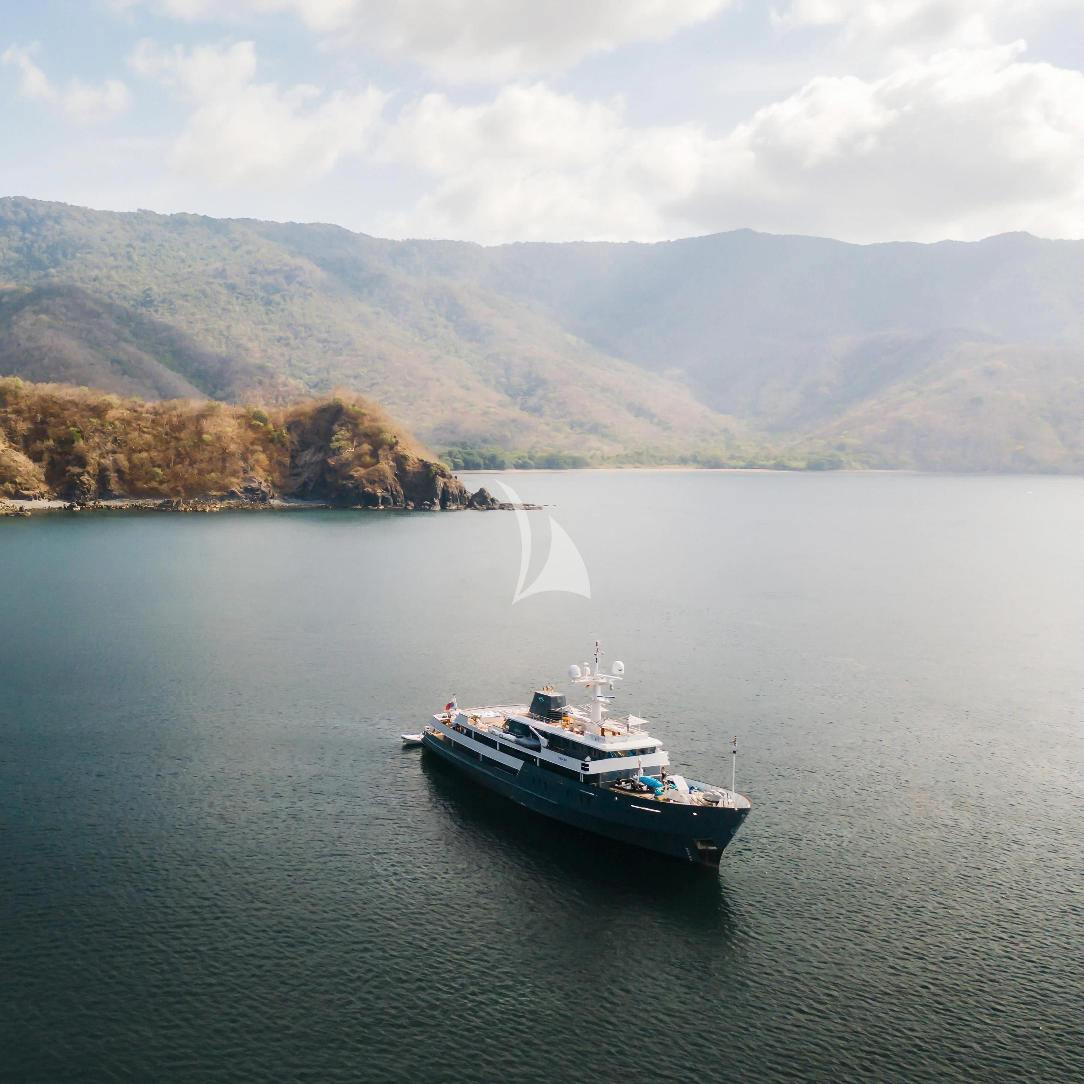 a boat sailing on the water aboard AQUA BLU Yacht for Sale