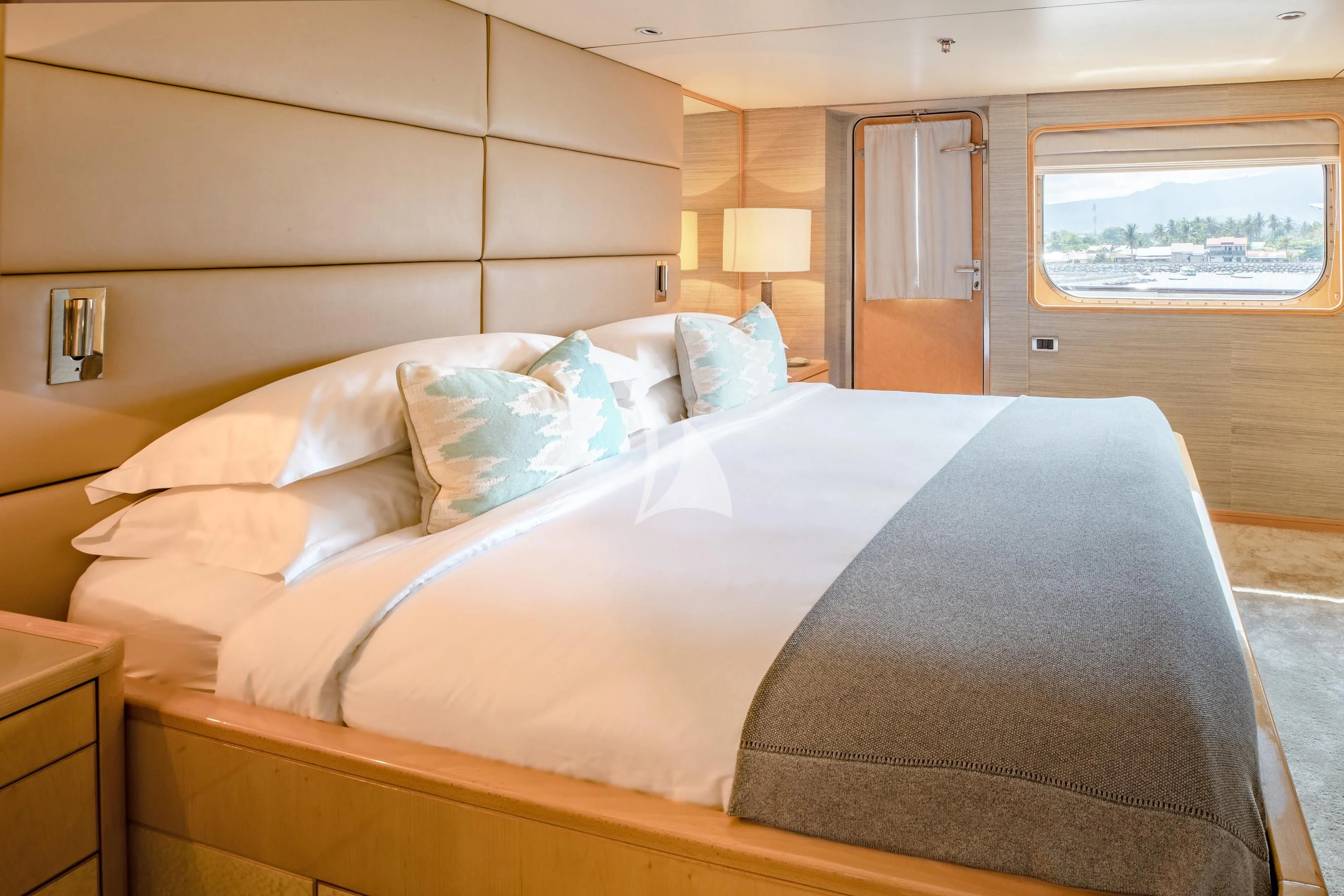 a bed with a large bed aboard AQUA BLU Yacht for Sale