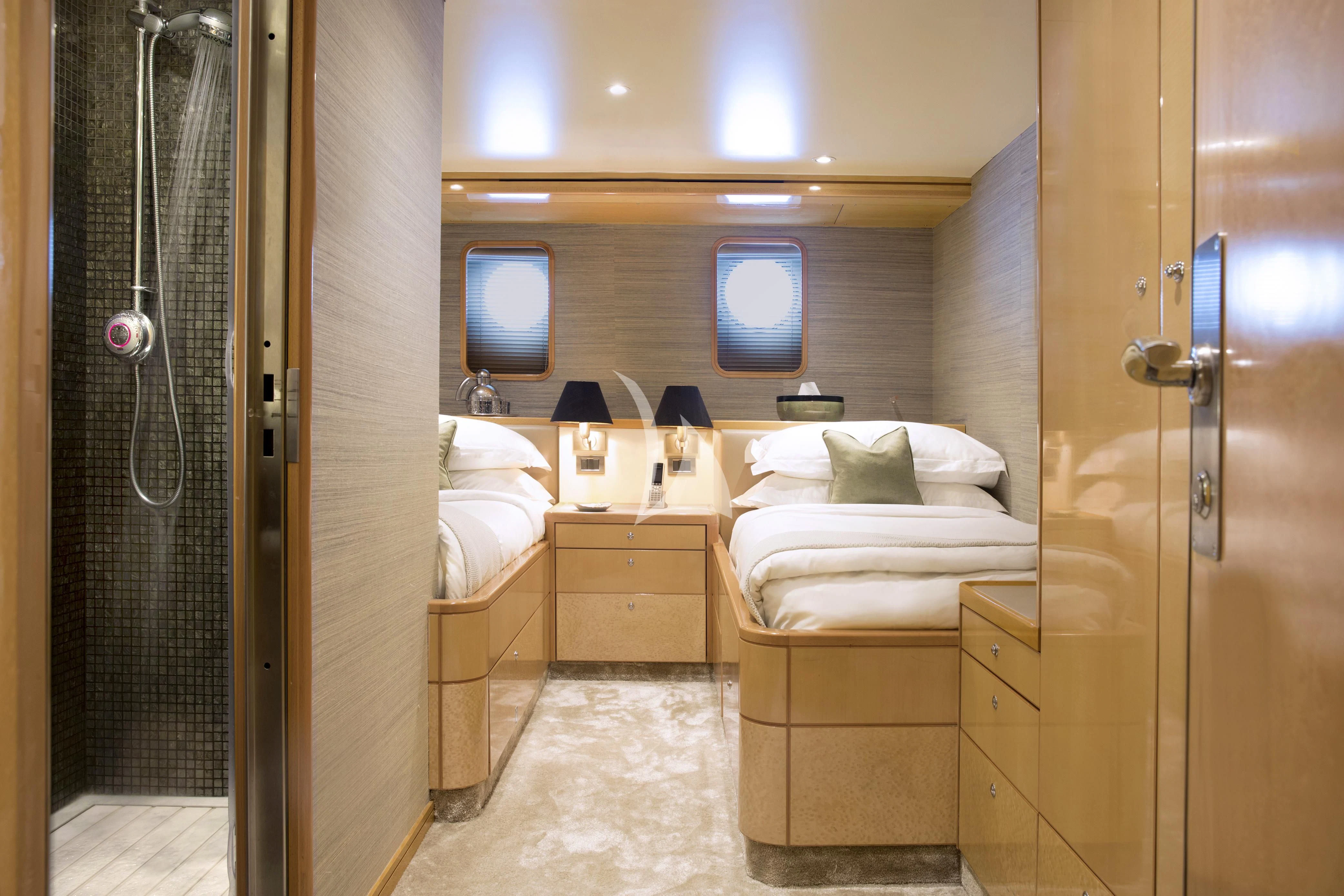 a room with a bed and a mirror aboard AQUA BLU Yacht for Sale