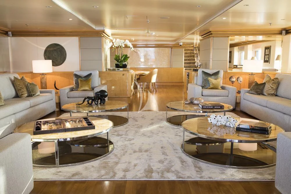 a living room with a large rug aboard AQUA BLU Yacht for Sale