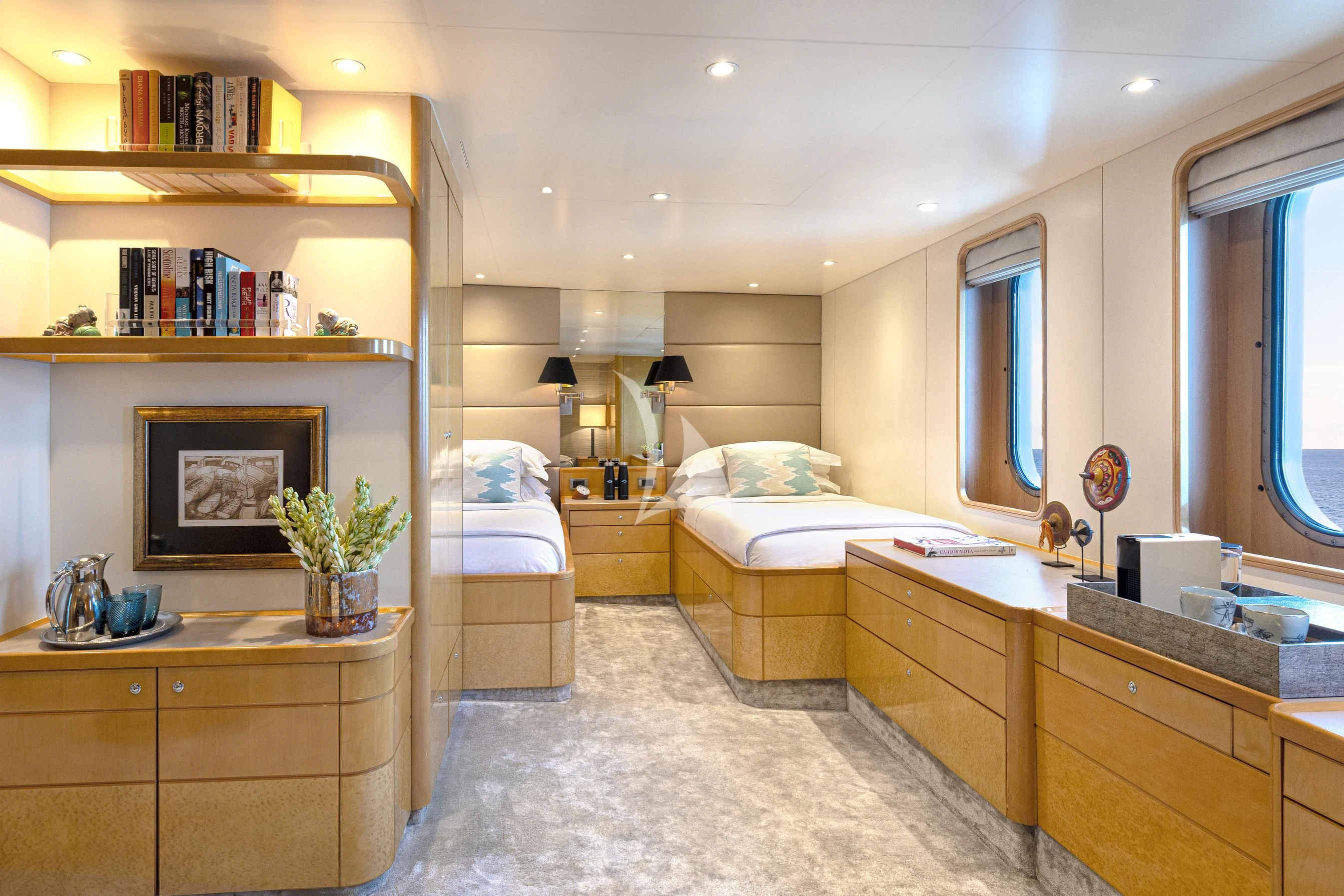 a bedroom with a couple of beds aboard AQUA BLU Yacht for Sale