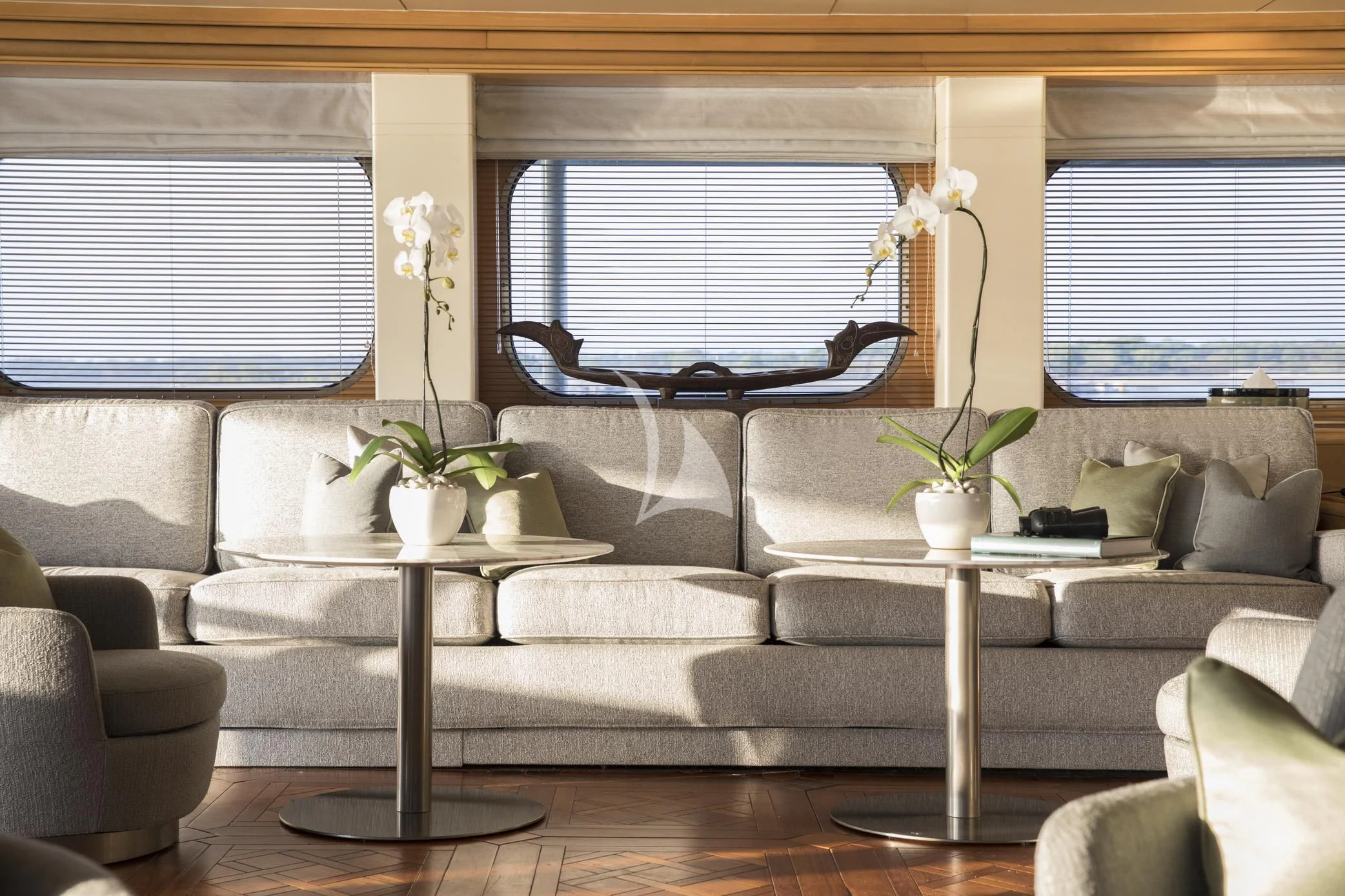 a living room with a couch and a coffee table aboard AQUA BLU Yacht for Sale