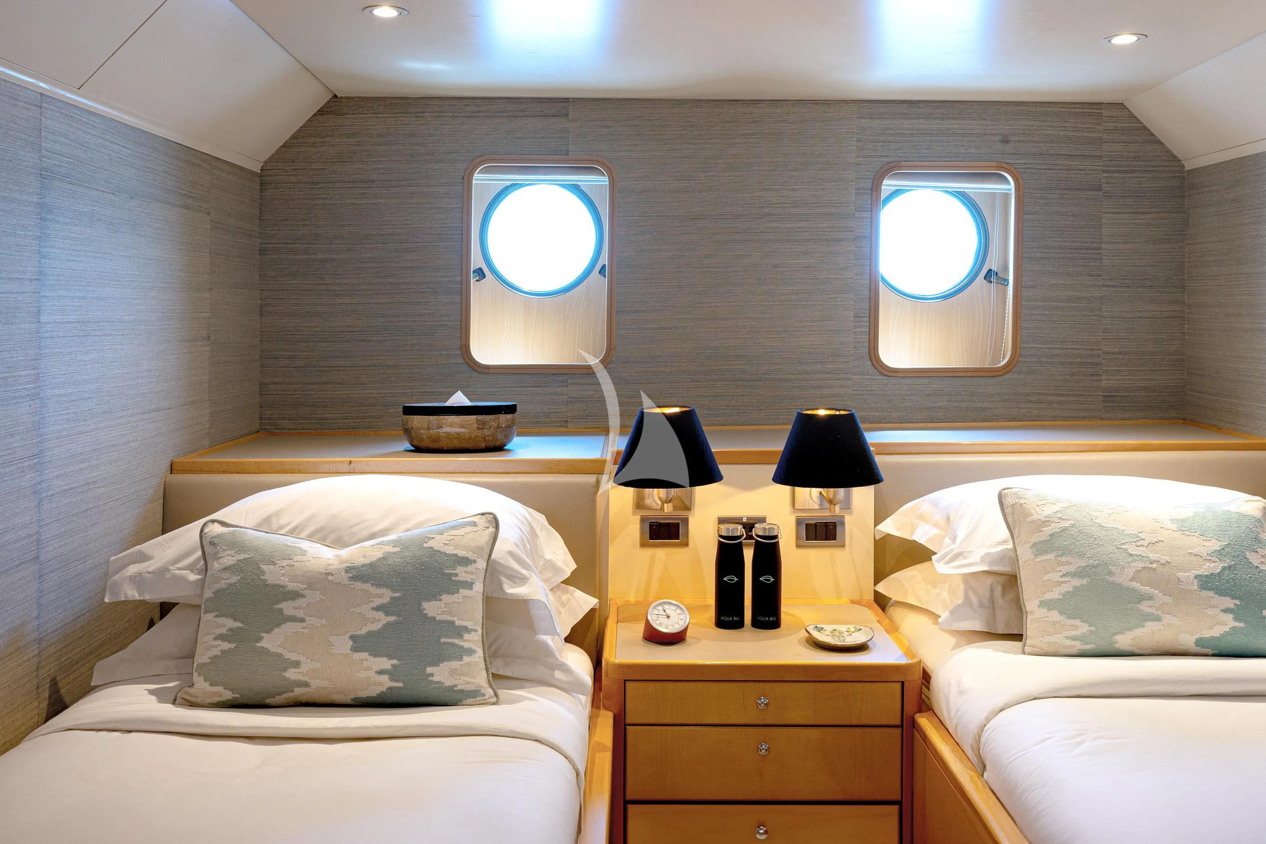a room with a bed and a mirror aboard AQUA BLU Yacht for Sale