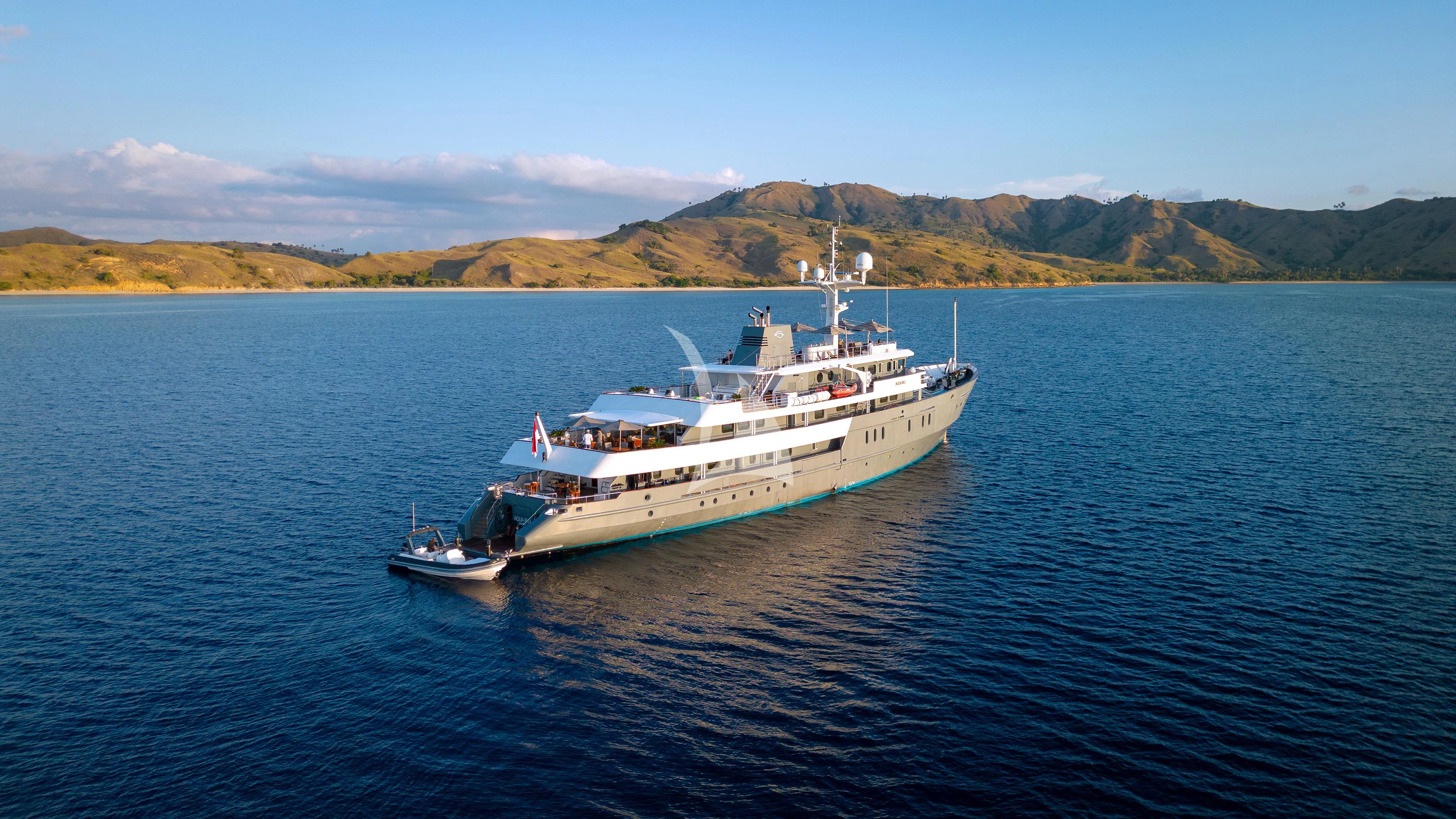 a boat in the water aboard AQUA BLU Yacht for Sale