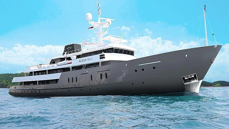 a large ship in the water aboard AQUA BLU Yacht for Sale