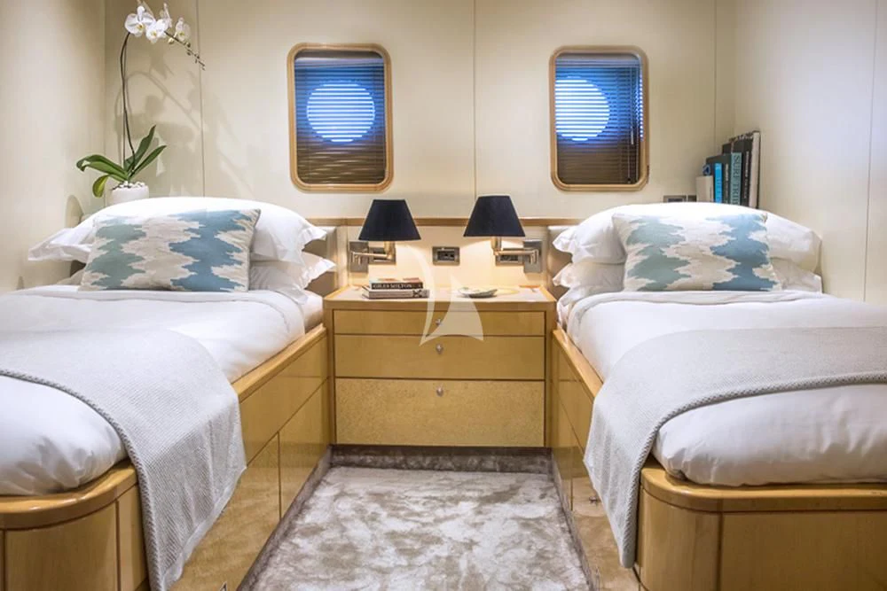 a couple of beds in a room aboard AQUA BLU Yacht for Sale