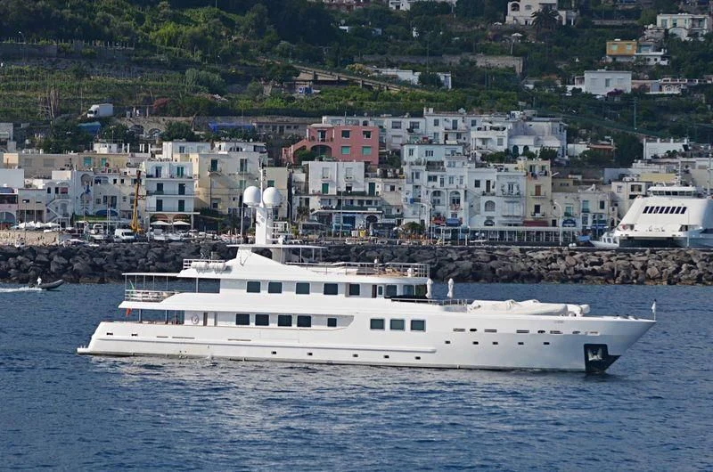 a white boat in the water aboard R23 Yacht for Charter