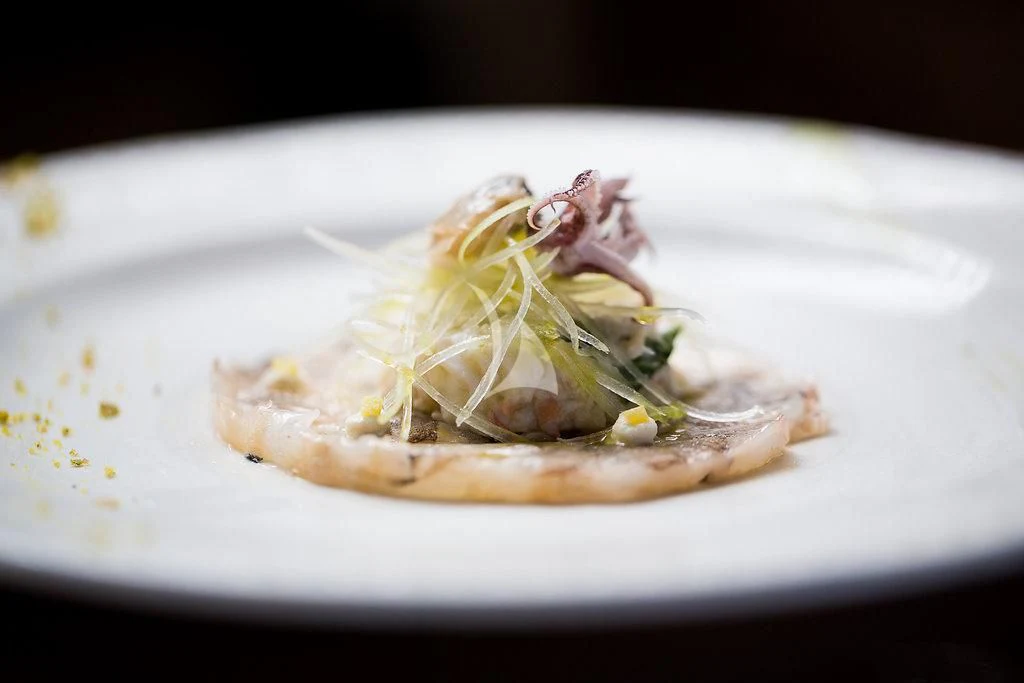 a plate of food aboard R23 Yacht for Charter