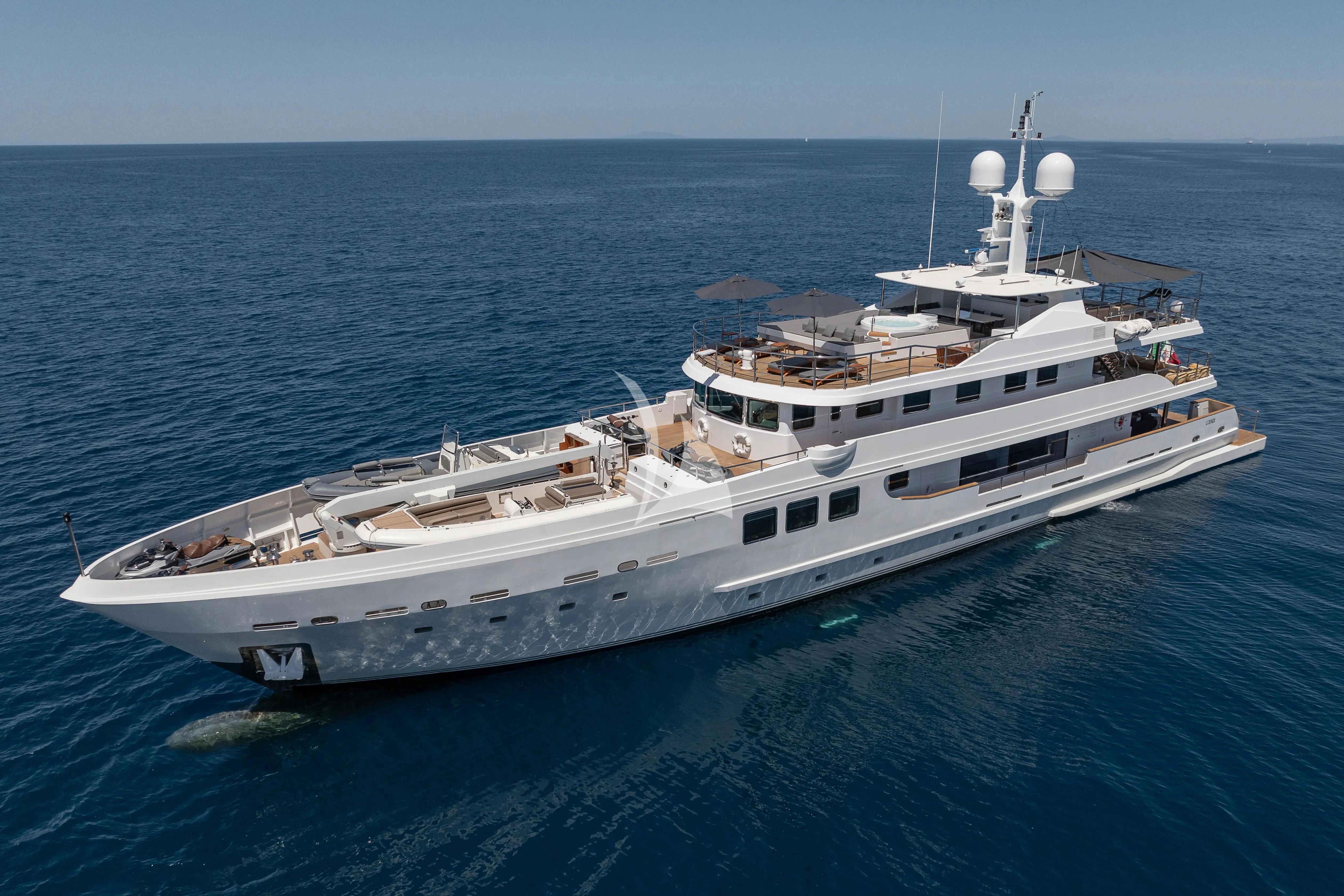 a large white ship in the water aboard R23 Yacht for Charter