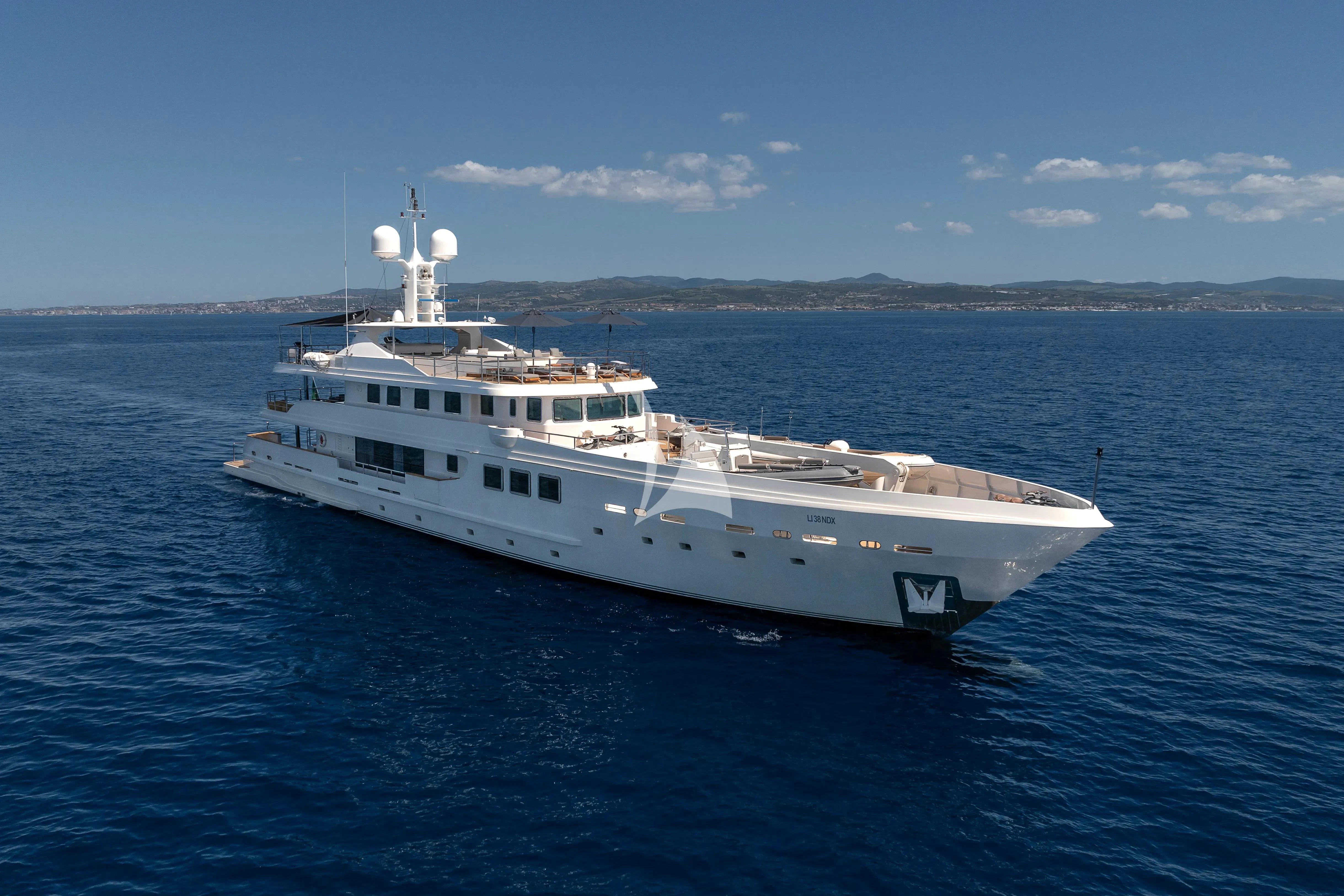 a large white boat in the water aboard R23 Yacht for Charter