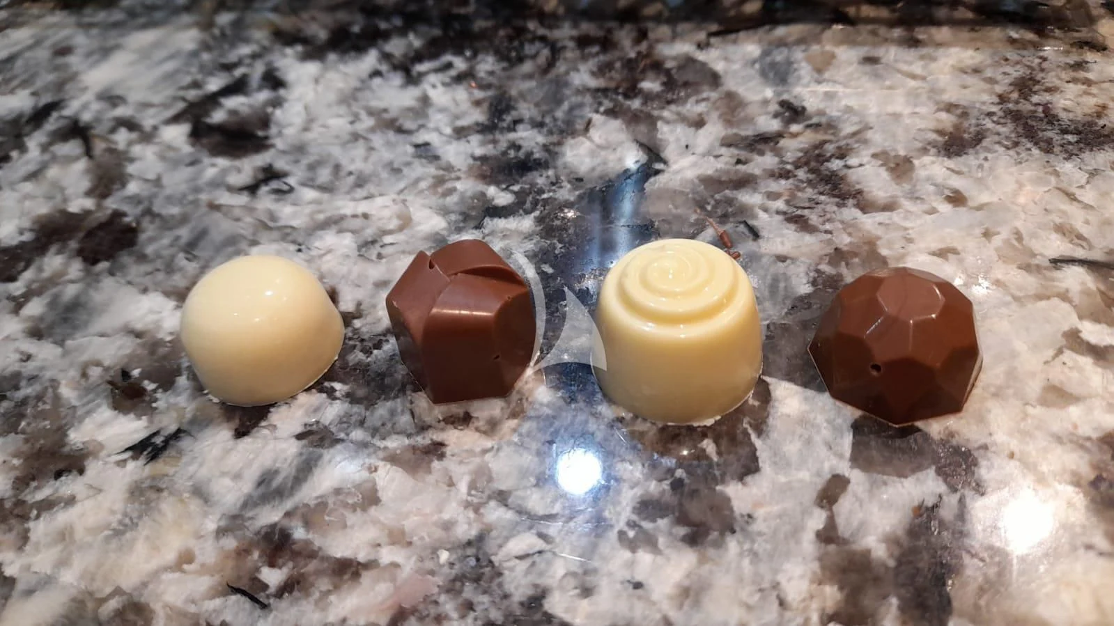 a group of eggs on a dirt surface aboard R23 Yacht for Charter