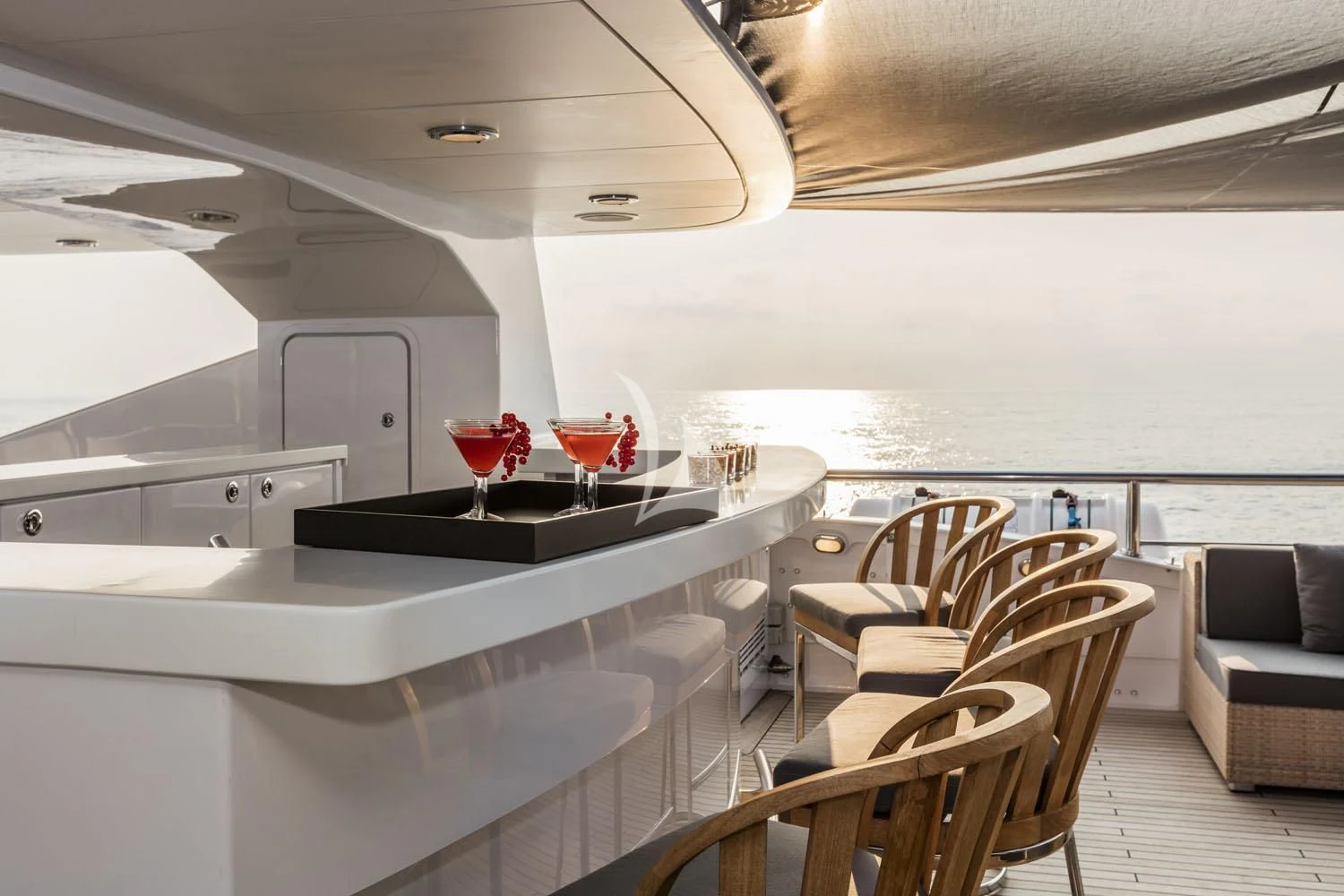 a modern looking living room aboard R23 Yacht for Charter