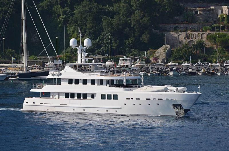 a white yacht in the water aboard R23 Yacht for Charter