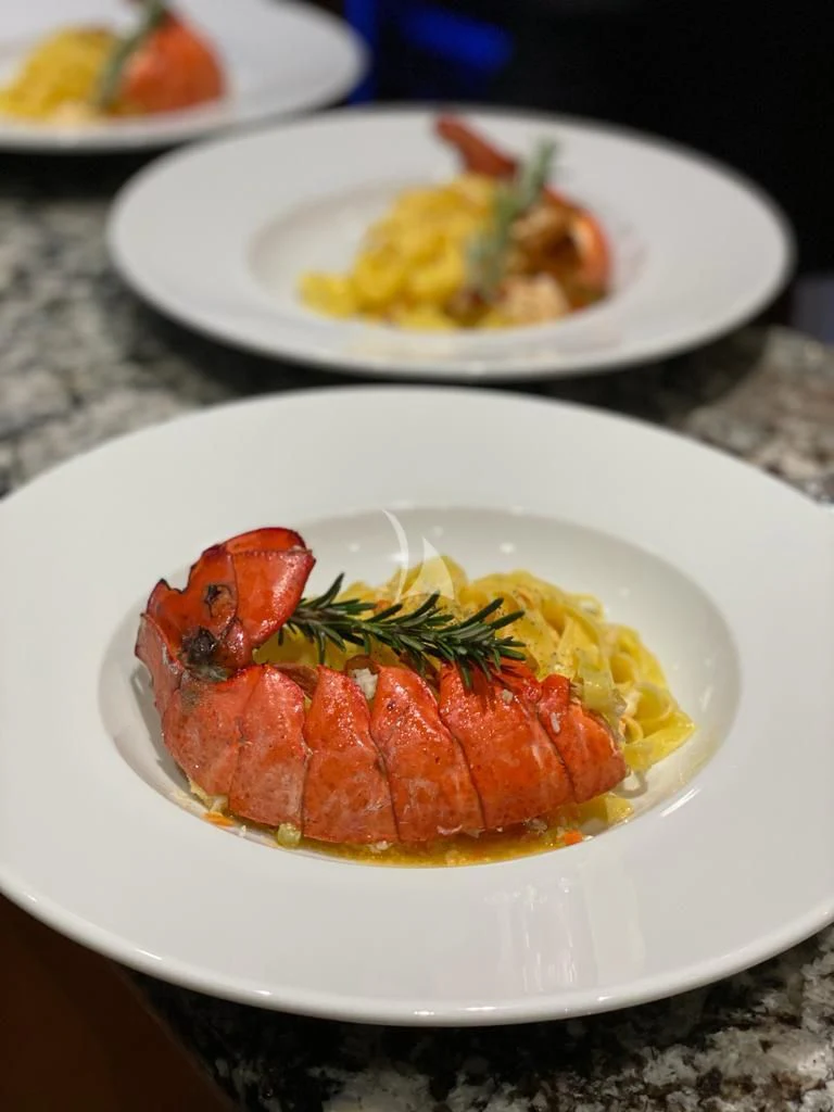 a plate of food aboard R23 Yacht for Charter