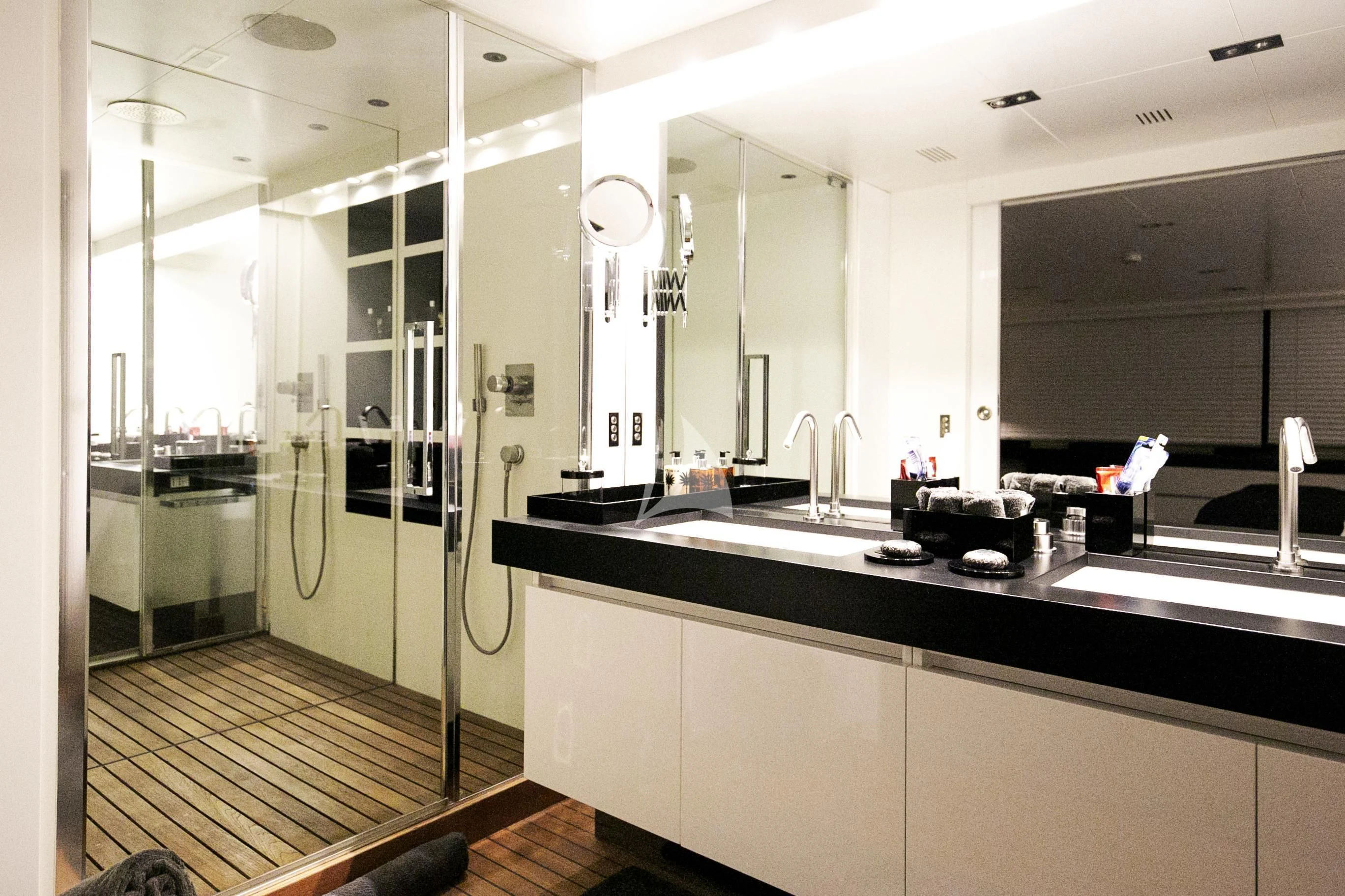 a kitchen with a large mirror aboard R23 Yacht for Charter