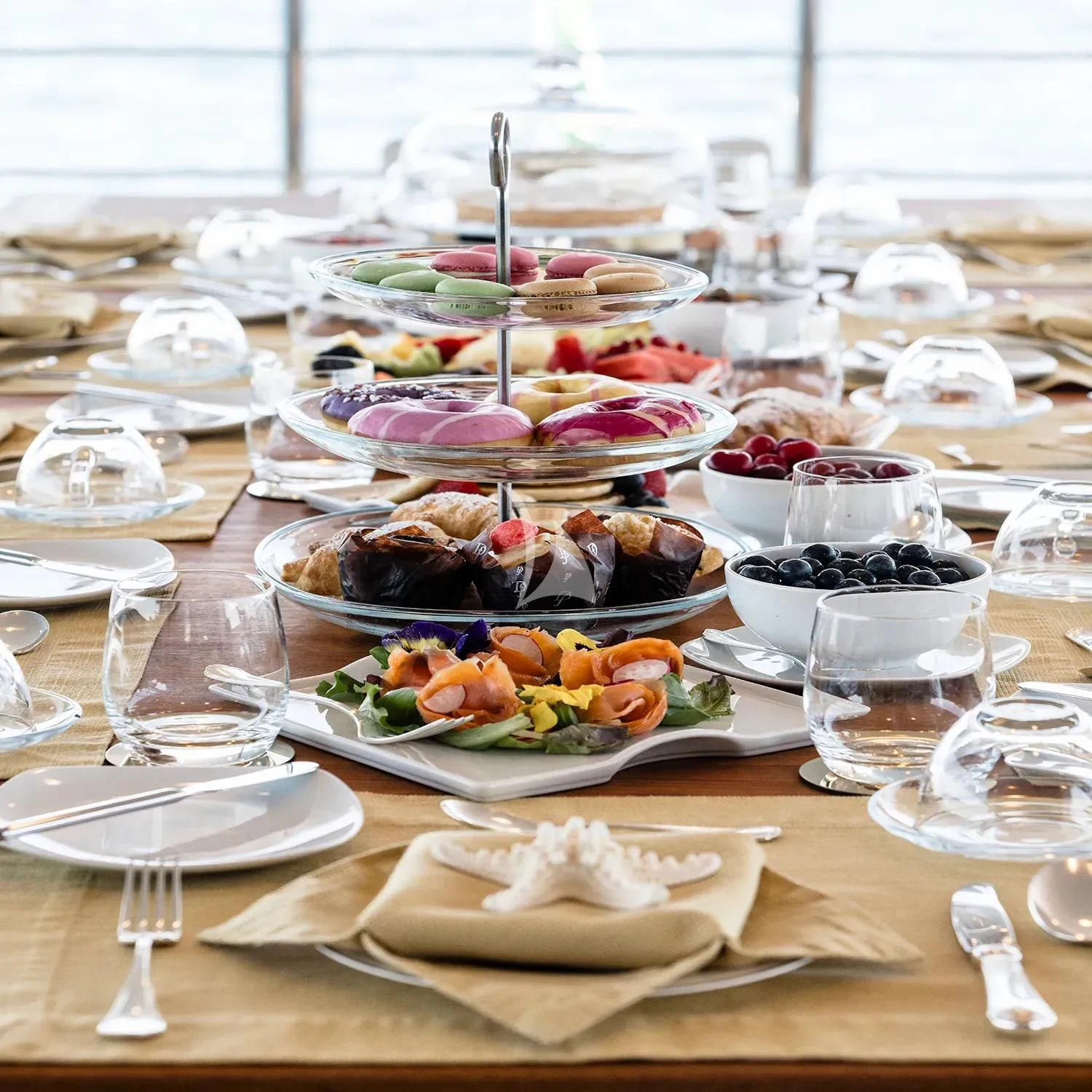 a table full of food aboard R23 Yacht for Charter