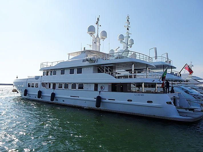 a large white boat in the water aboard R23 Yacht for Charter