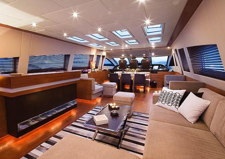 a room with a couch and a table aboard ALEON Yacht for Sale