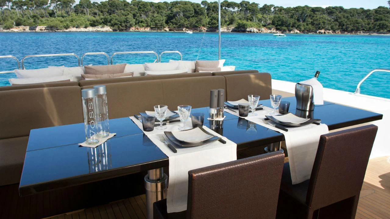 a table set for a dinner aboard ALEON Yacht for Sale