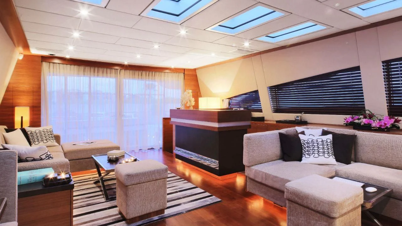 a living room with a large tv aboard ALEON Yacht for Sale