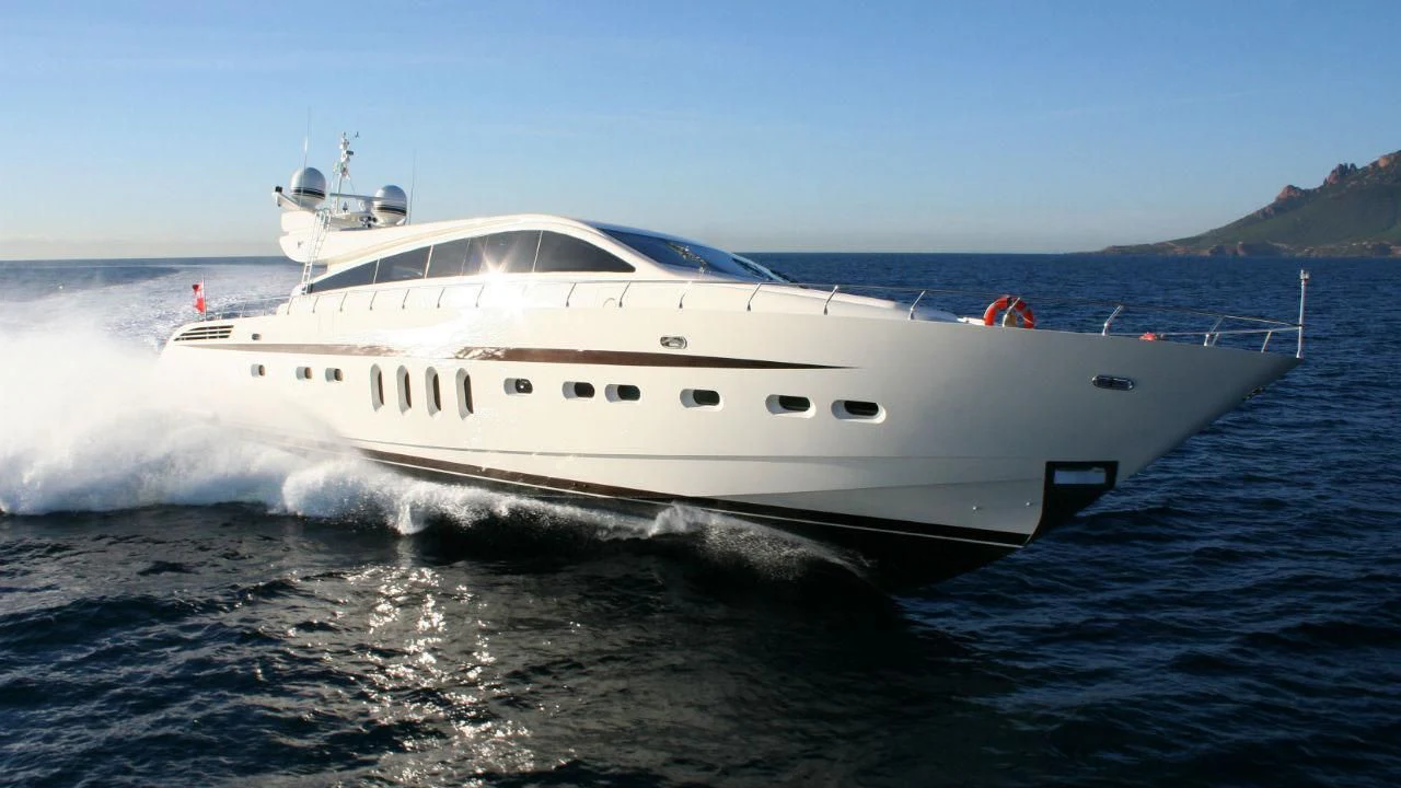 a white yacht on the water aboard ALEON Yacht for Sale