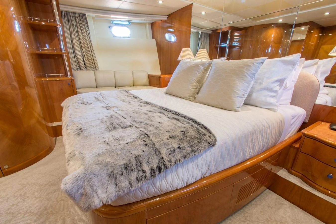 a bed with white sheets aboard NO NAME AZIMUT 100 JUMBO Yacht for Sale