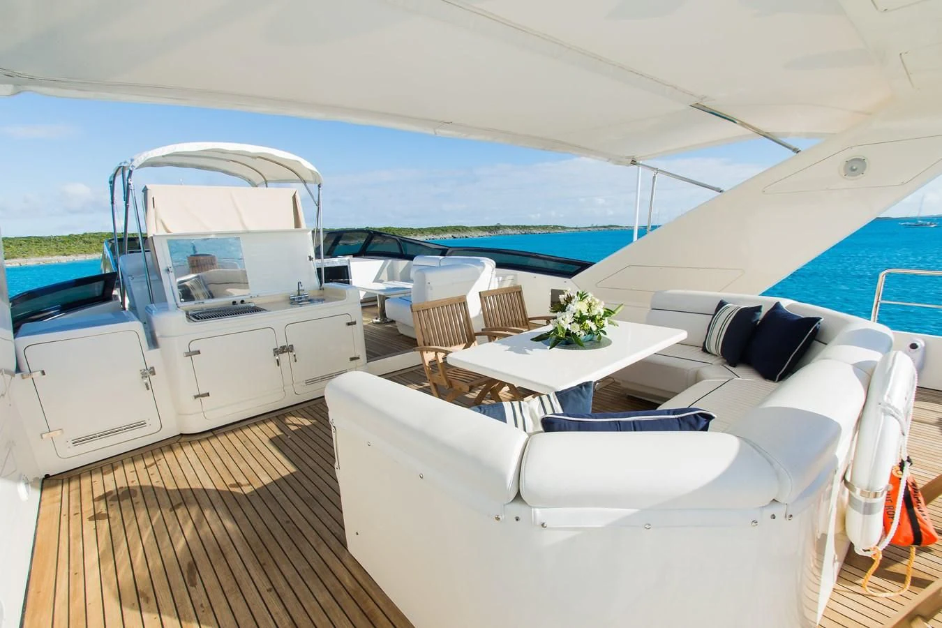 a boat with a table and chairs aboard NO NAME AZIMUT 100 JUMBO Yacht for Sale
