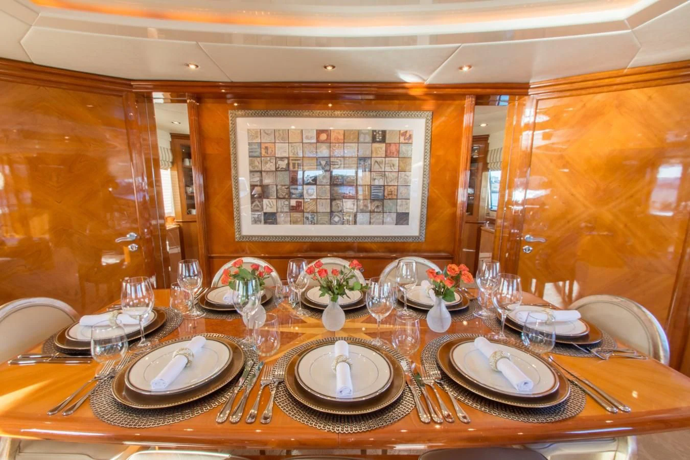 a table set with place settings aboard NO NAME AZIMUT 100 JUMBO Yacht for Sale
