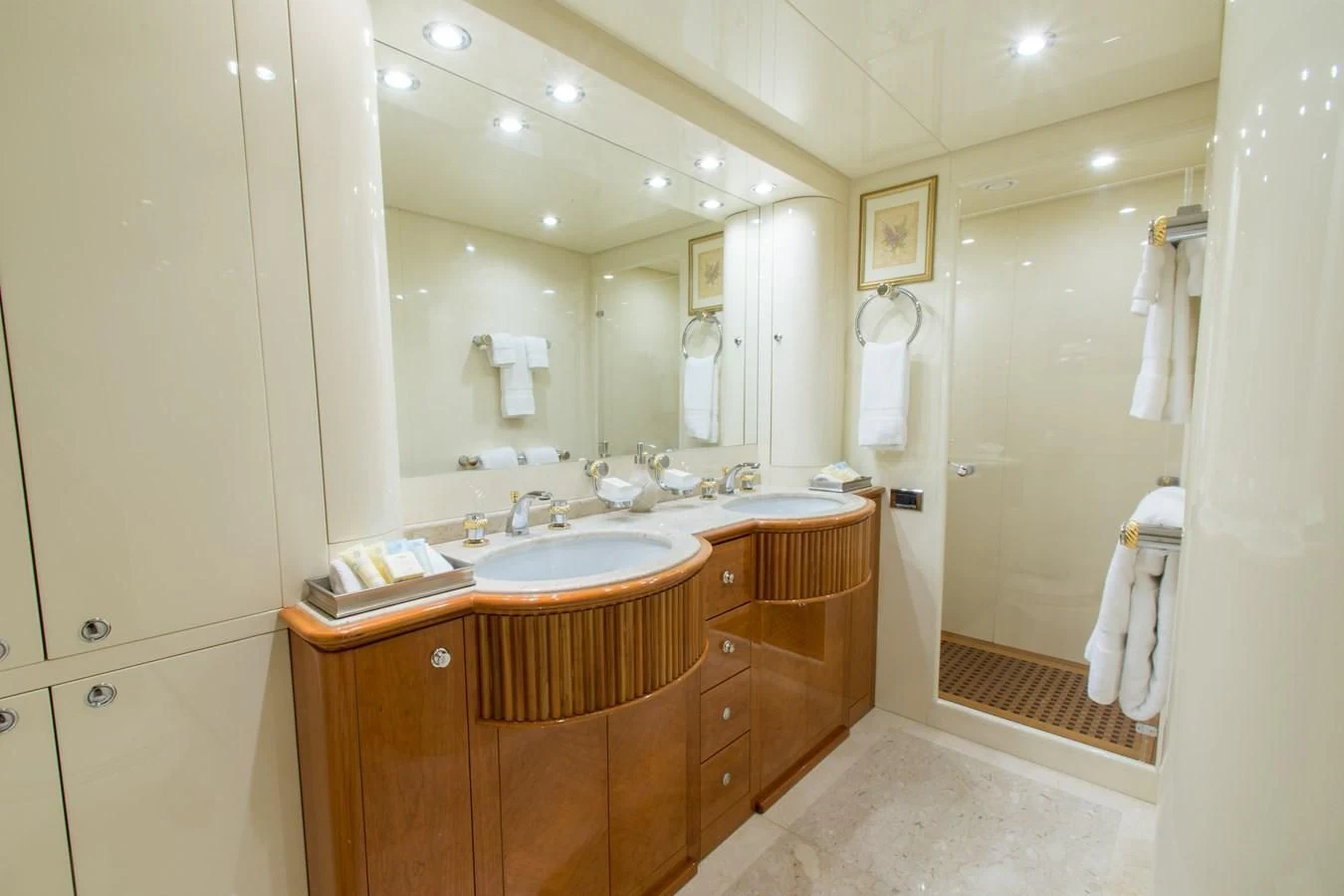 a bathroom with a sink and a mirror aboard NO NAME AZIMUT 100 JUMBO Yacht for Sale