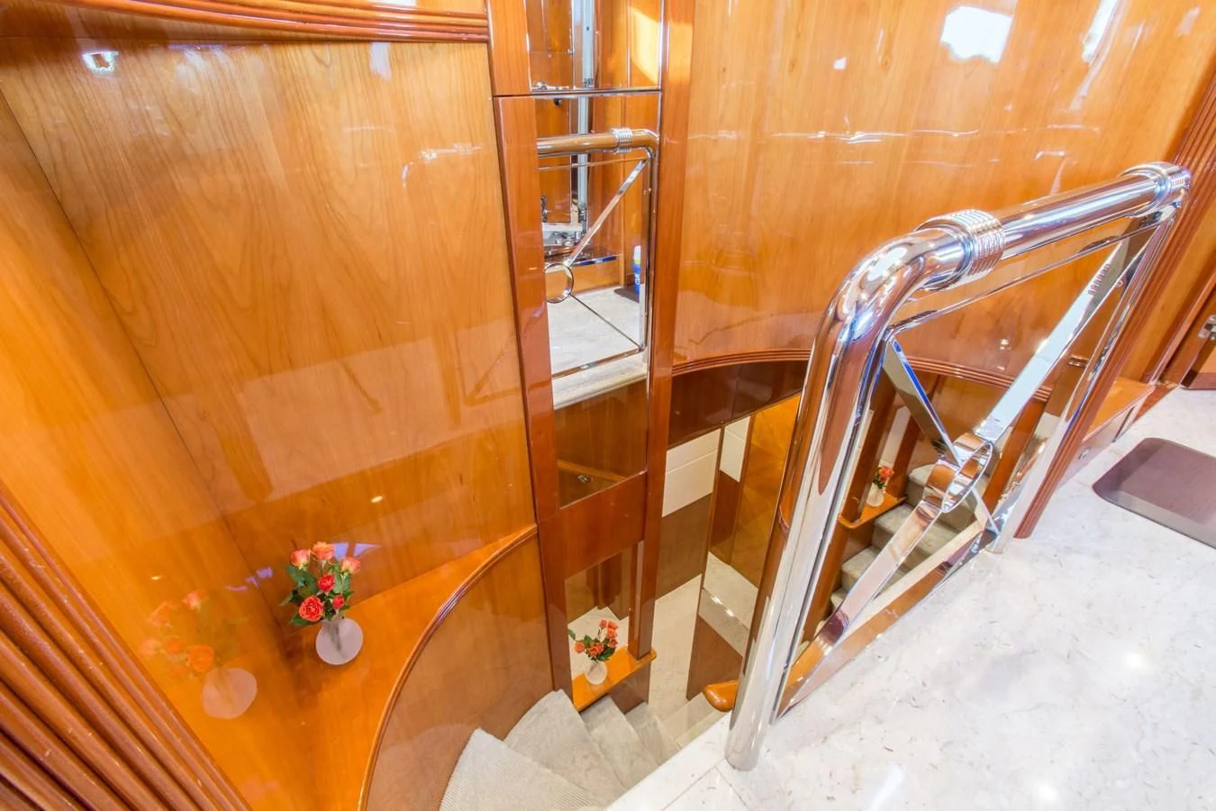 a staircase with a glass railing aboard NO NAME AZIMUT 100 JUMBO Yacht for Sale
