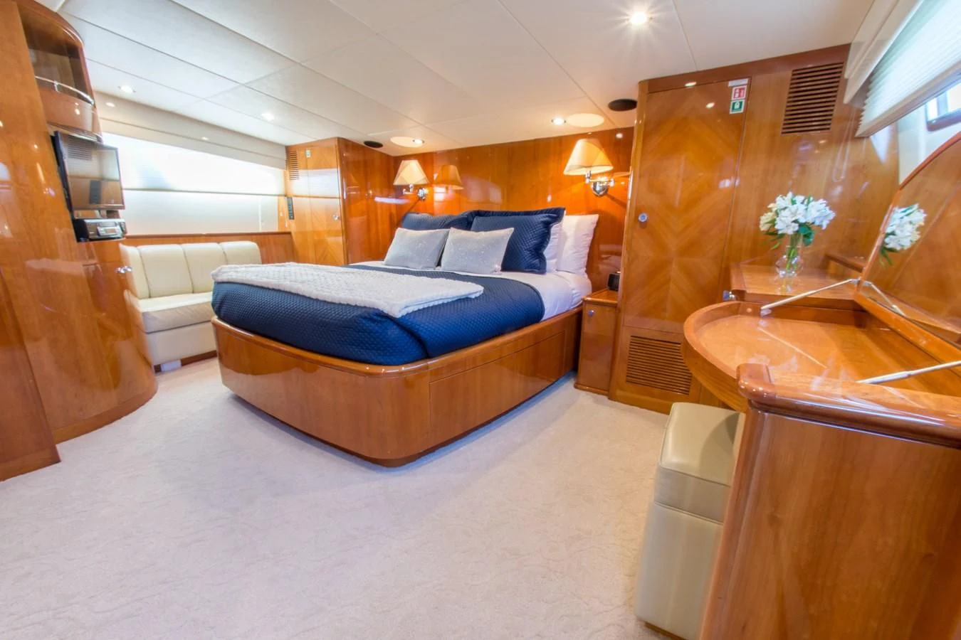 a bedroom with a bed and a desk aboard NO NAME AZIMUT 100 JUMBO Yacht for Sale