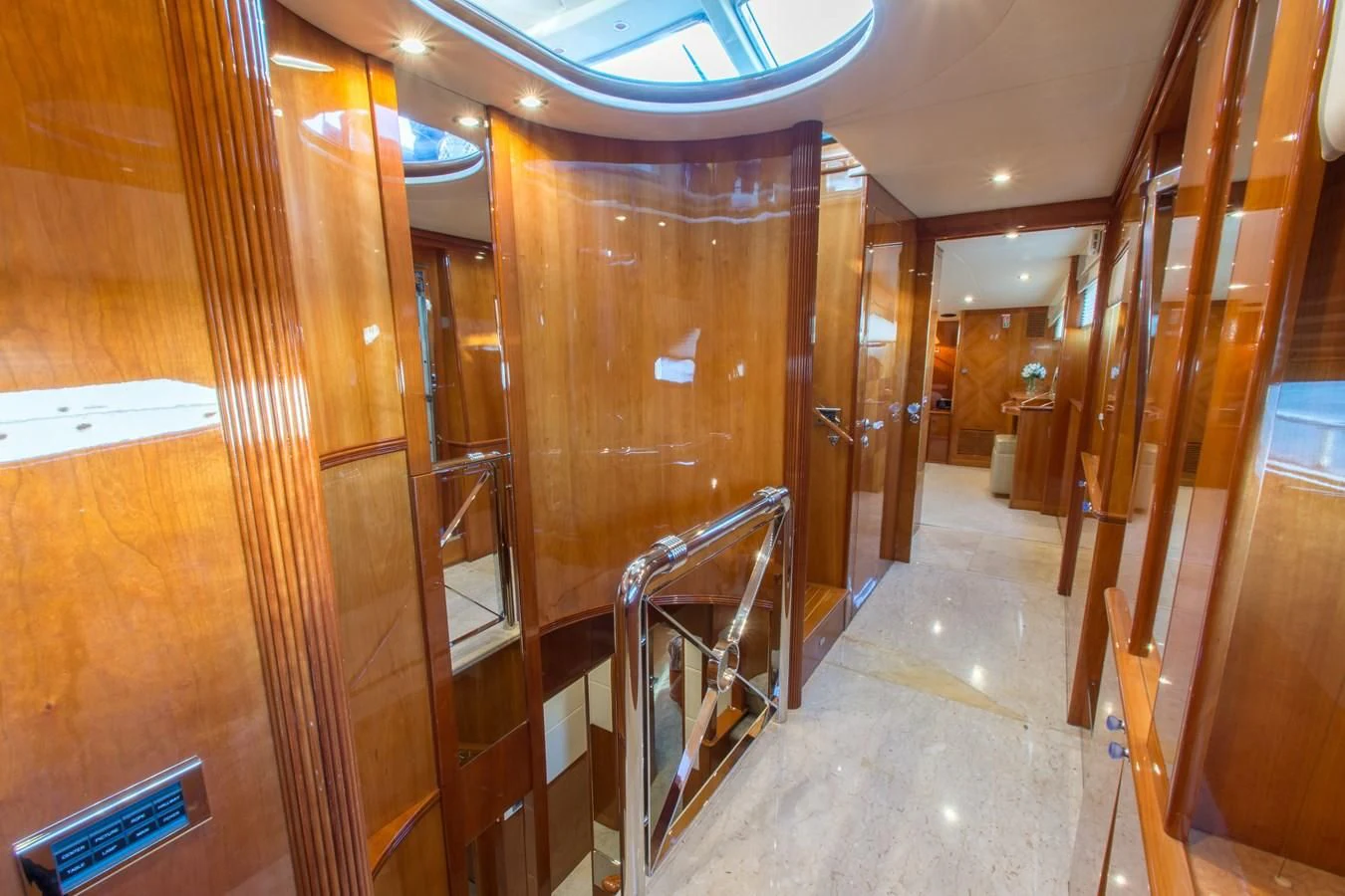 a hallway with glass doors aboard NO NAME AZIMUT 100 JUMBO Yacht for Sale