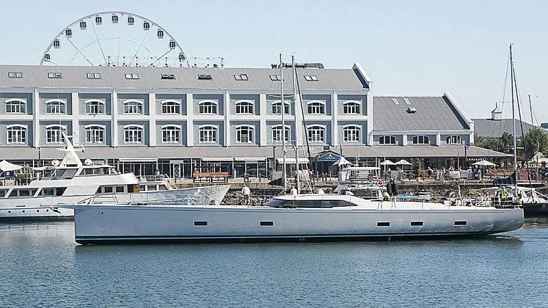 a large white boat sits in the water aboard POWER OF 2 Yacht for Sale