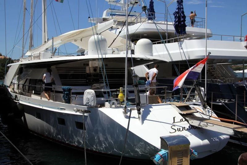 a boat docked at a pier aboard LADY SUNSHINE Yacht for Sale