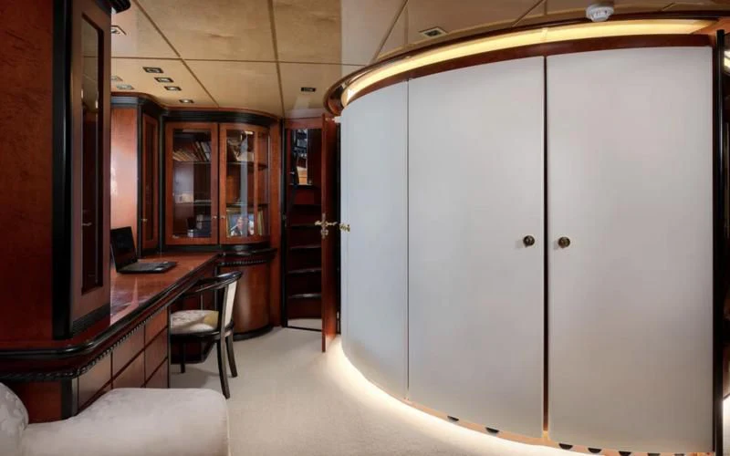 a room with a table and chairs aboard LADY SUNSHINE Yacht for Sale