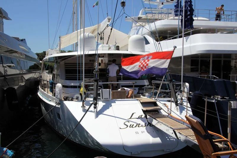a boat docked at a pier aboard LADY SUNSHINE Yacht for Sale