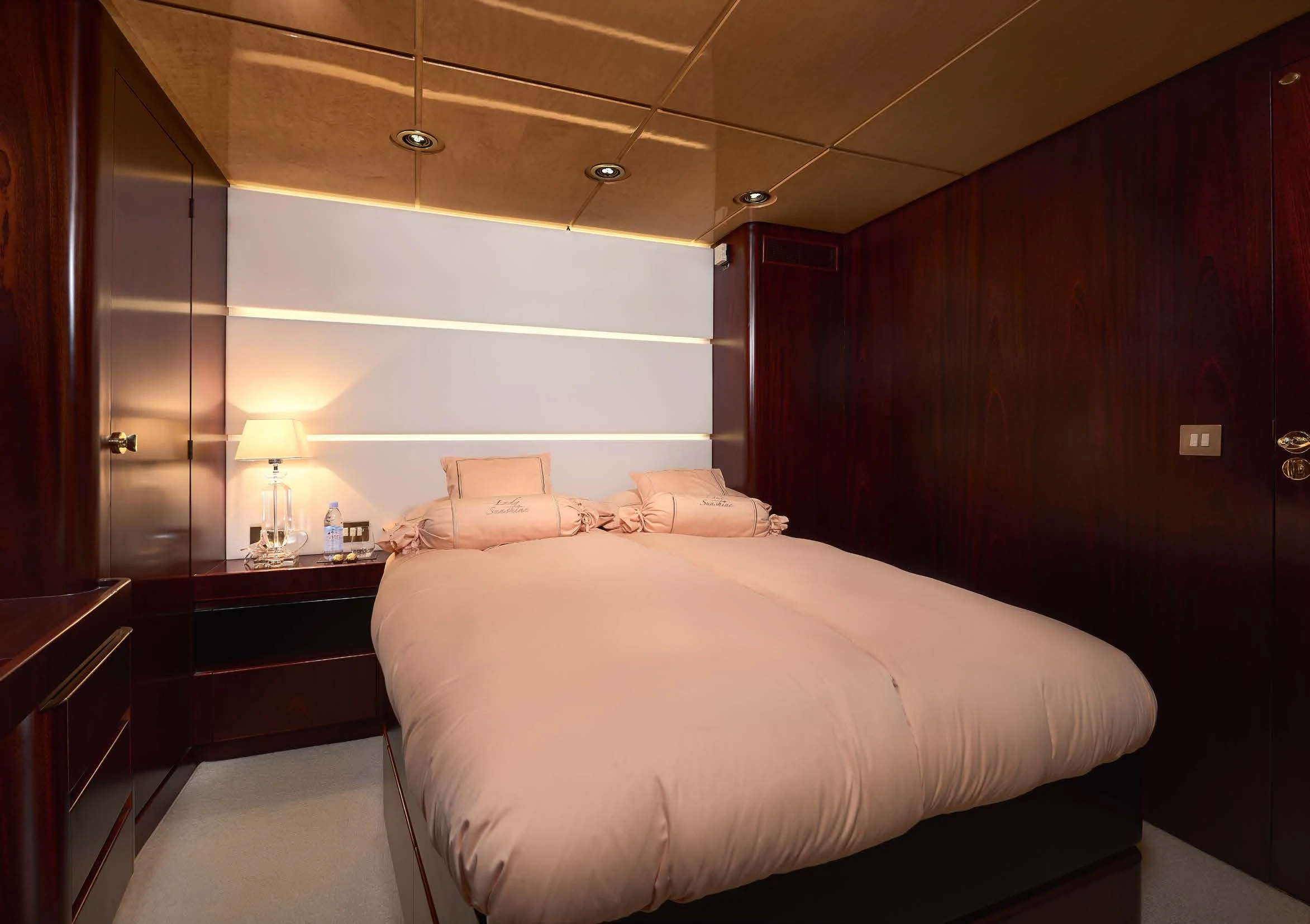 a bed in a room aboard LADY SUNSHINE Yacht for Sale