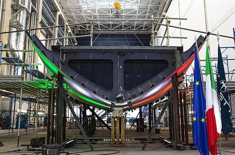 a large metal machine with flags aboard INFINITY Yacht for Sale