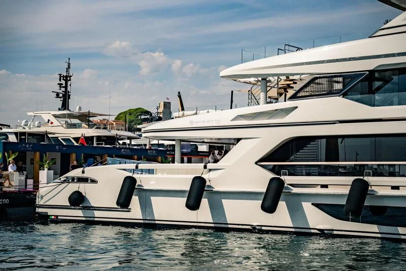 a boat docked at a pier aboard INFINITY Yacht for Sale