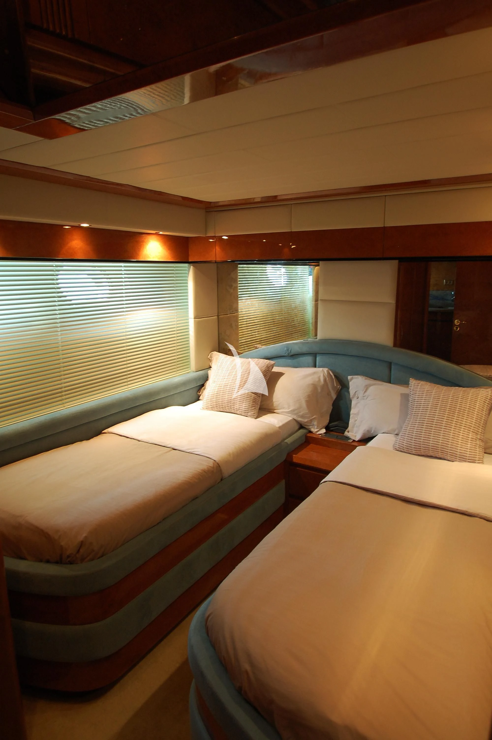 a room with beds and a window aboard LEIGH Yacht for Sale