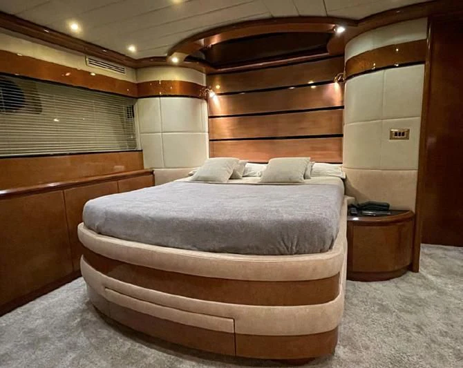 a bed in a room aboard LEIGH Yacht for Sale