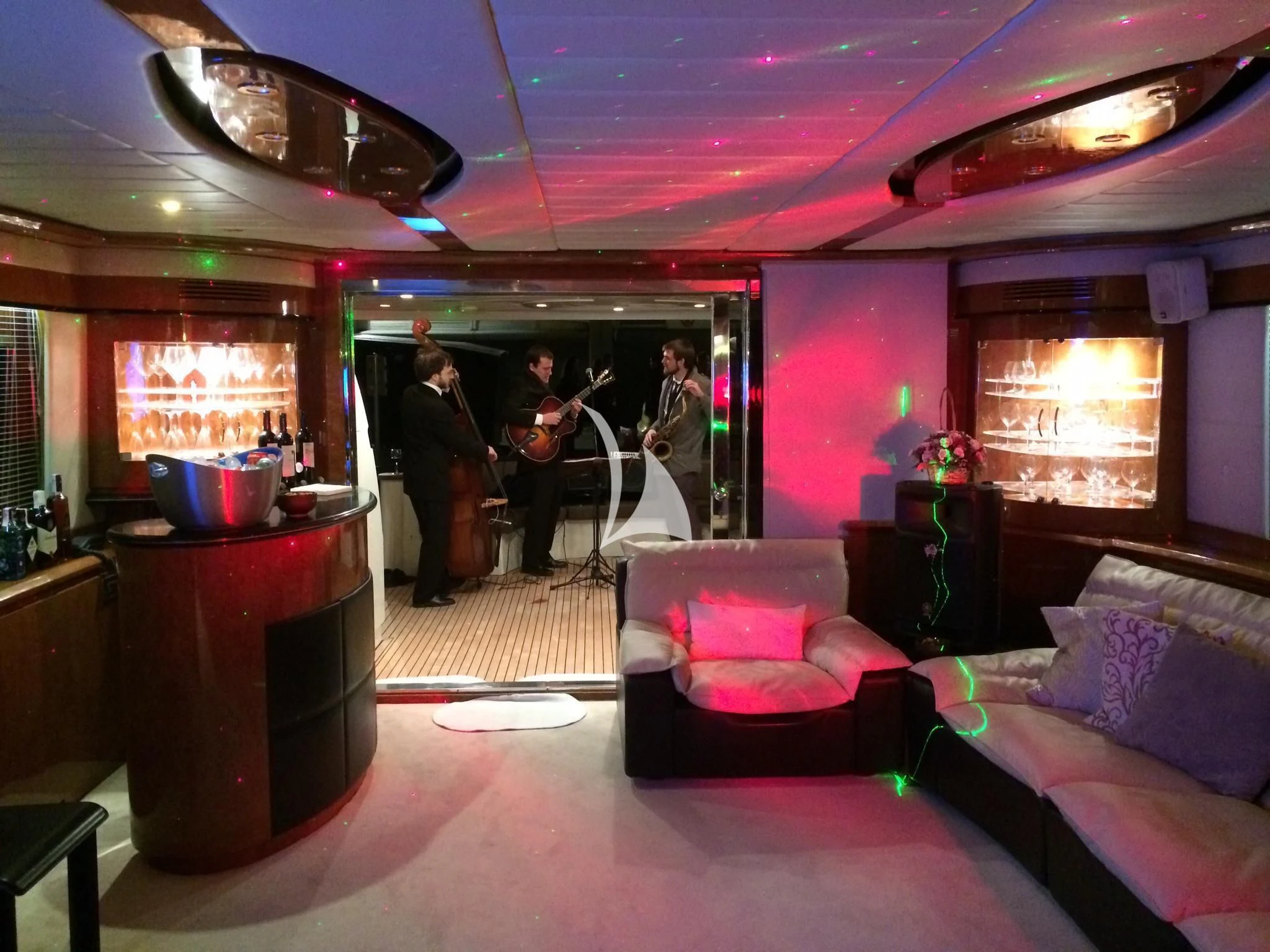a couple of people in a room aboard LEIGH Yacht for Sale