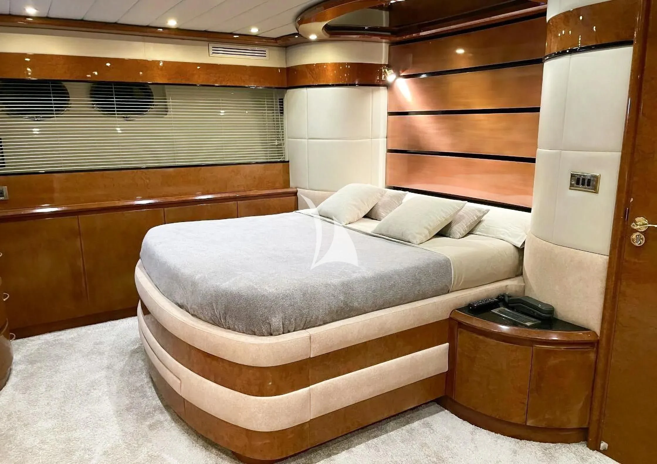 a room with a bed and a desk aboard LEIGH Yacht for Sale
