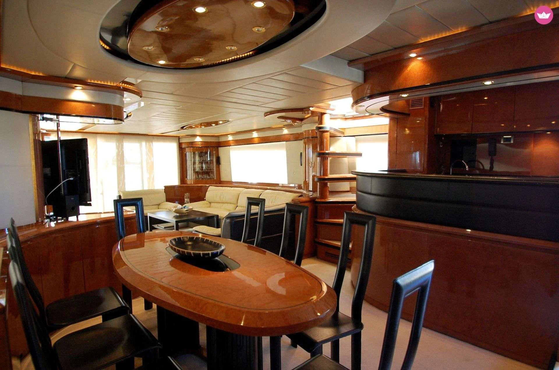 a dining room with a table and chairs aboard LEIGH Yacht for Sale