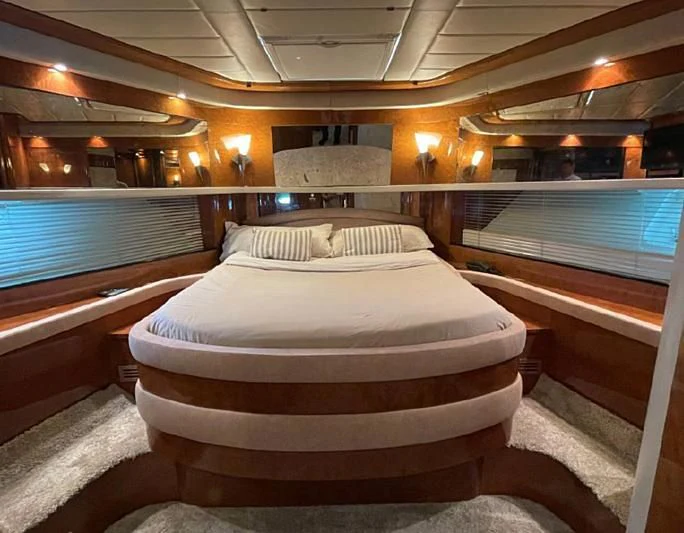 a bed in a room aboard LEIGH Yacht for Sale