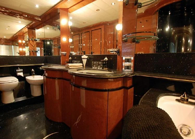 a bathroom with a sink and toilet aboard LEIGH Yacht for Sale