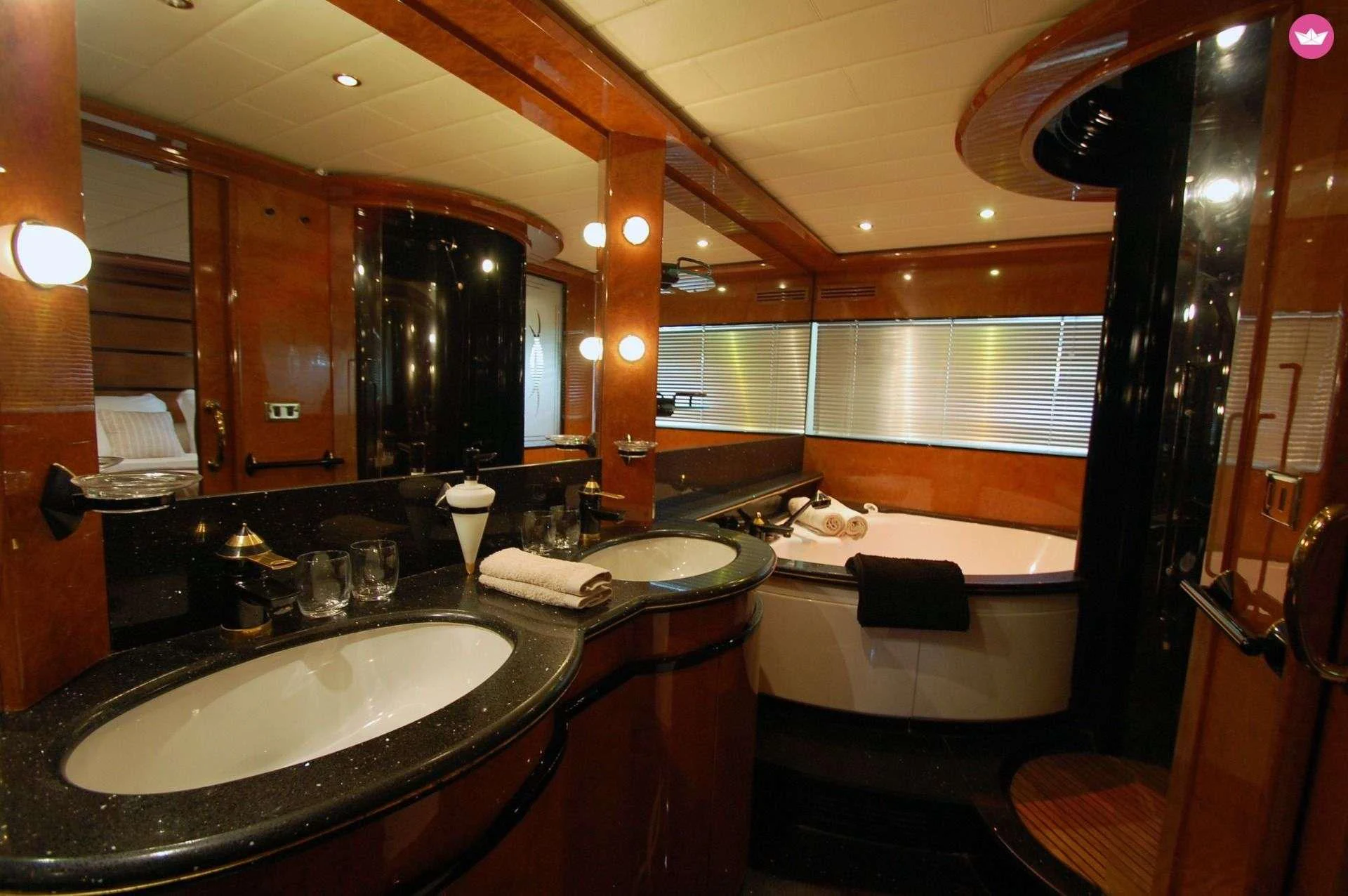 a bathroom with a large mirror aboard LEIGH Yacht for Sale