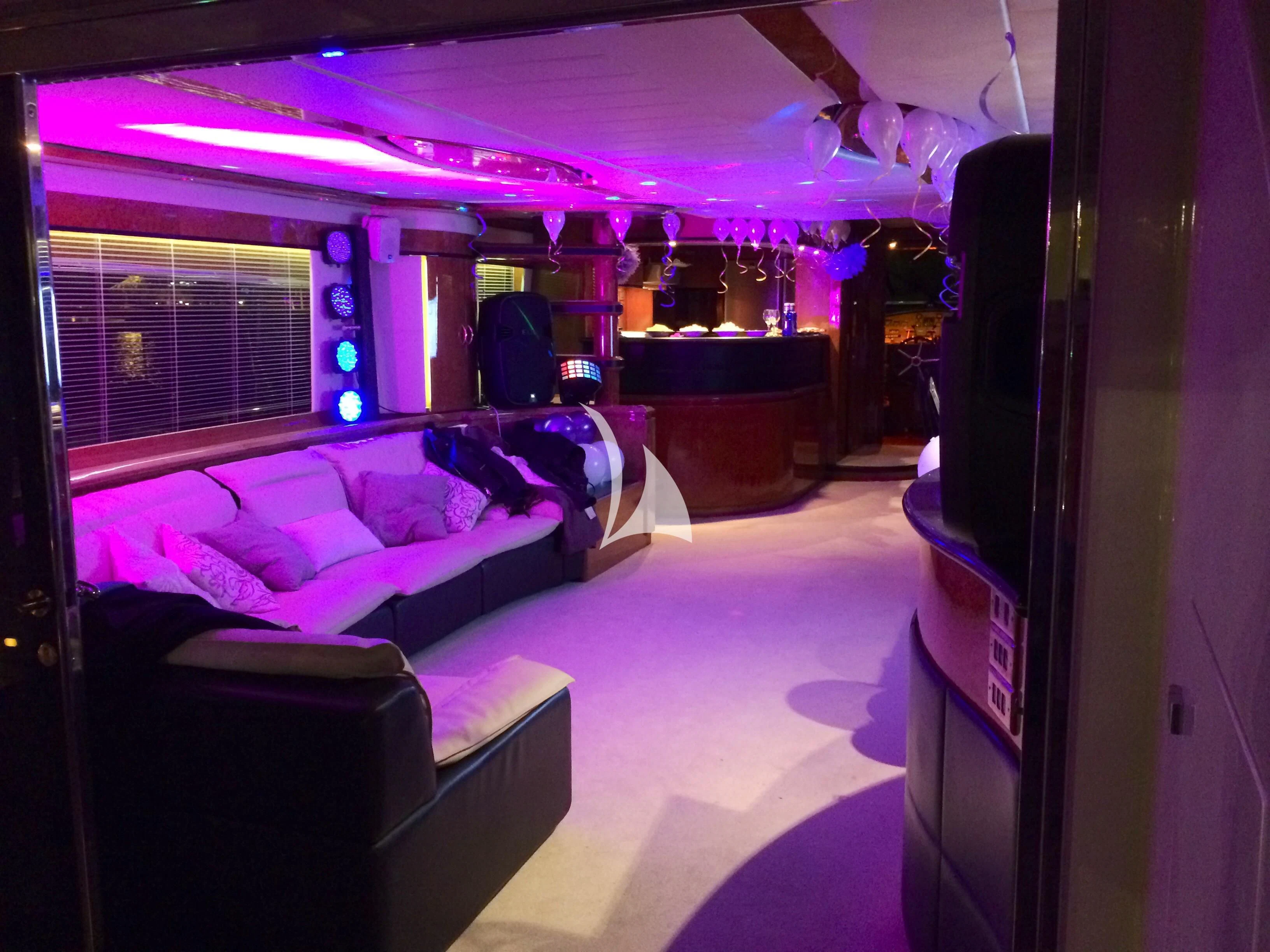a room with a bed and a television aboard LEIGH Yacht for Sale