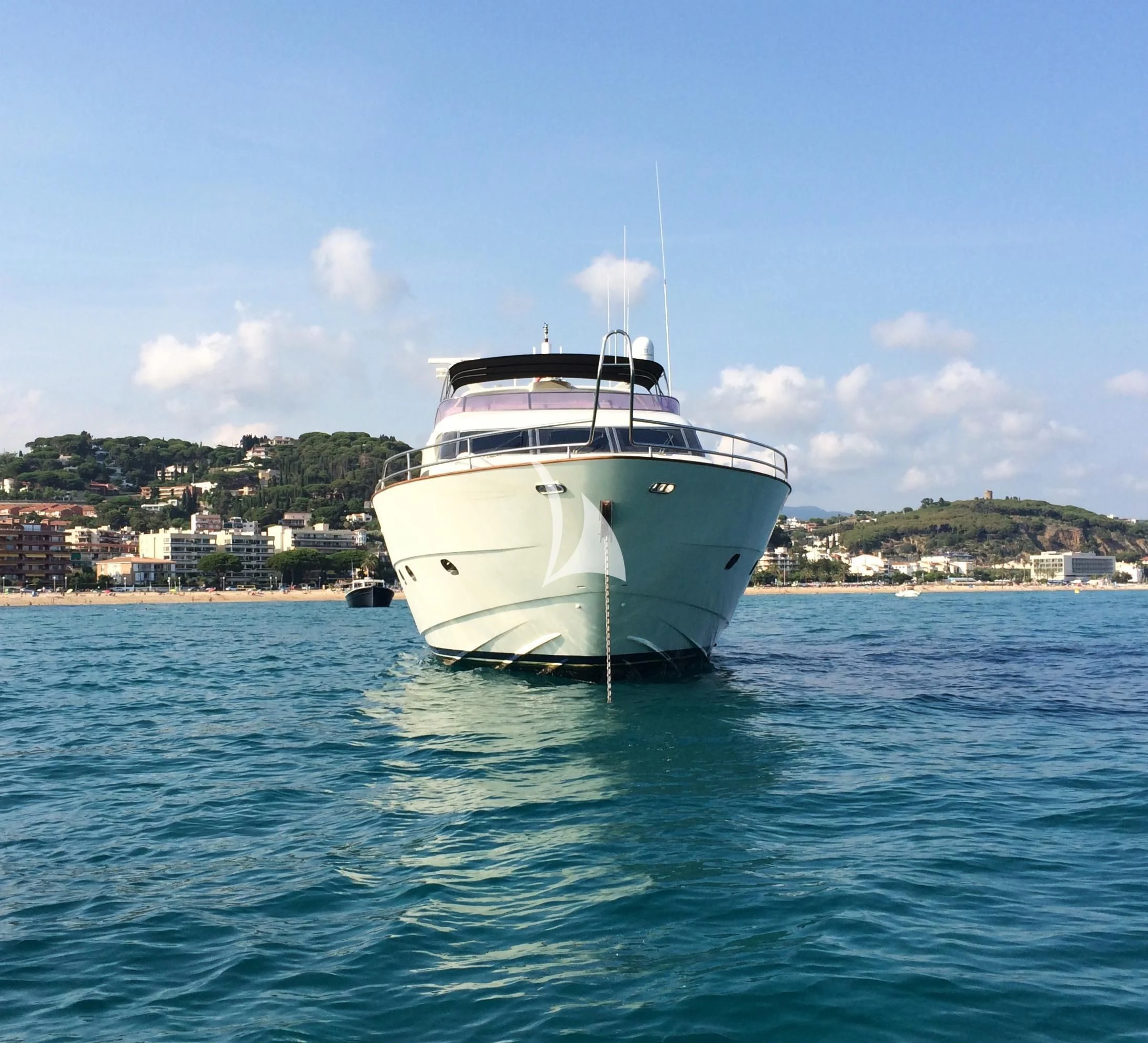 a white boat in the water aboard LEIGH Yacht for Sale