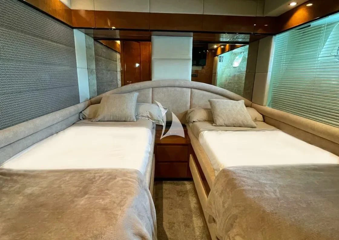 a couple of beds in a room aboard LEIGH Yacht for Sale